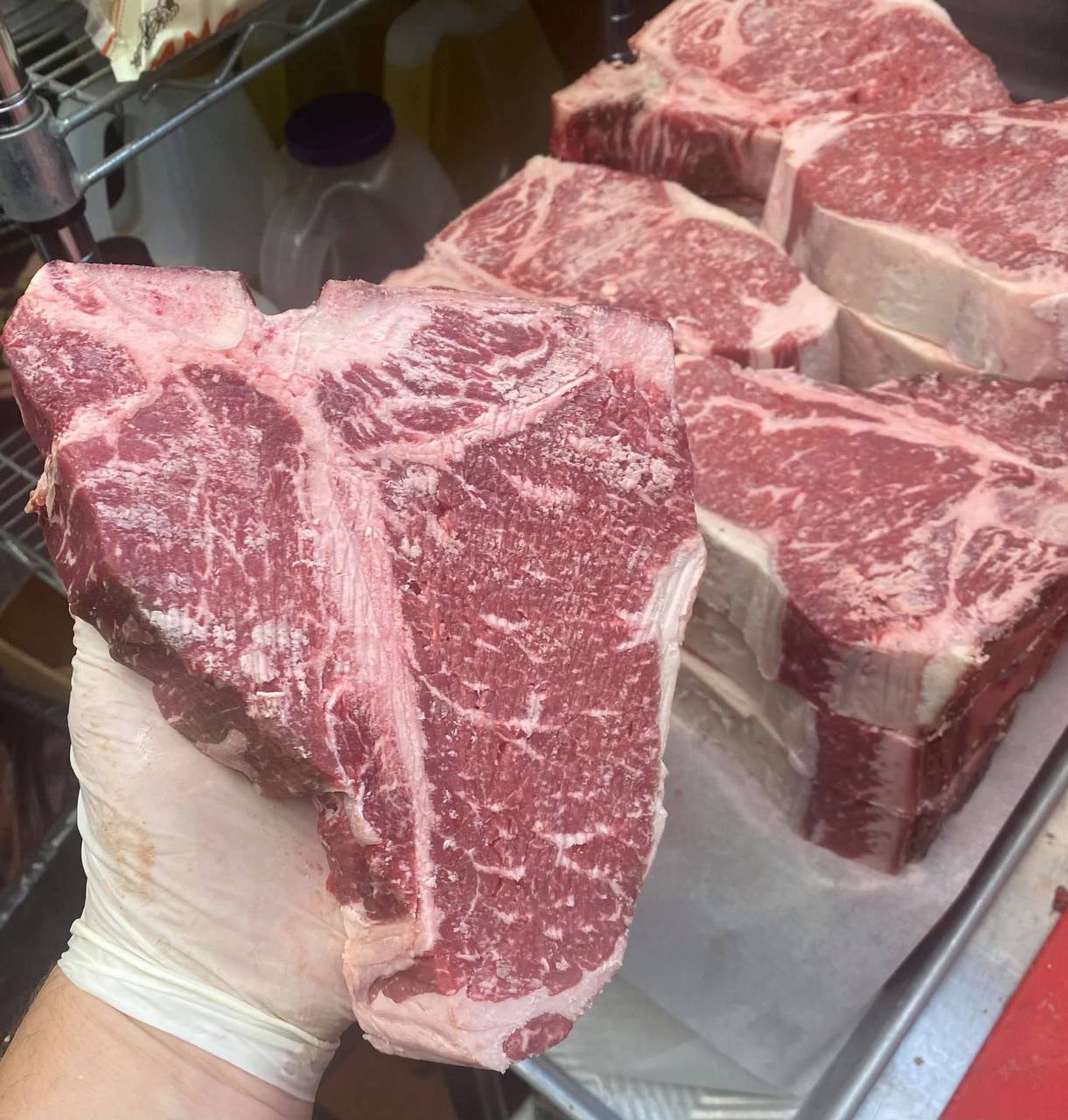 USDA Prime porterhouse cuts, dry-aged in-house